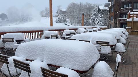 Tables covered with snow at Deer Valley Resort.