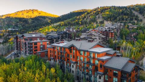 Deer Valley lodging properties surrounded by foliage.