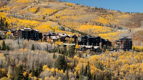 Captivating autumn scenery showcasing luxurious properties at Deer Valley Resort.