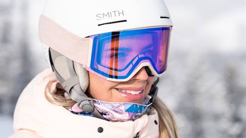 Woman wearing pink goggles.