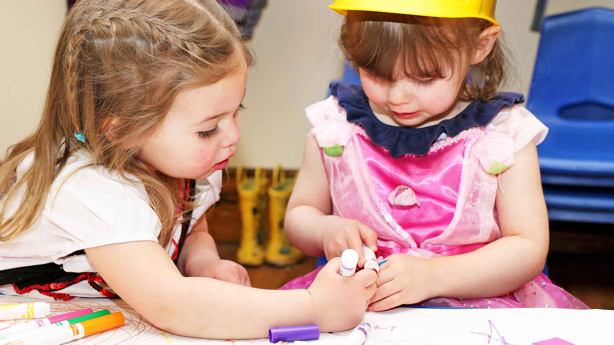 Little Girls Coloring Together