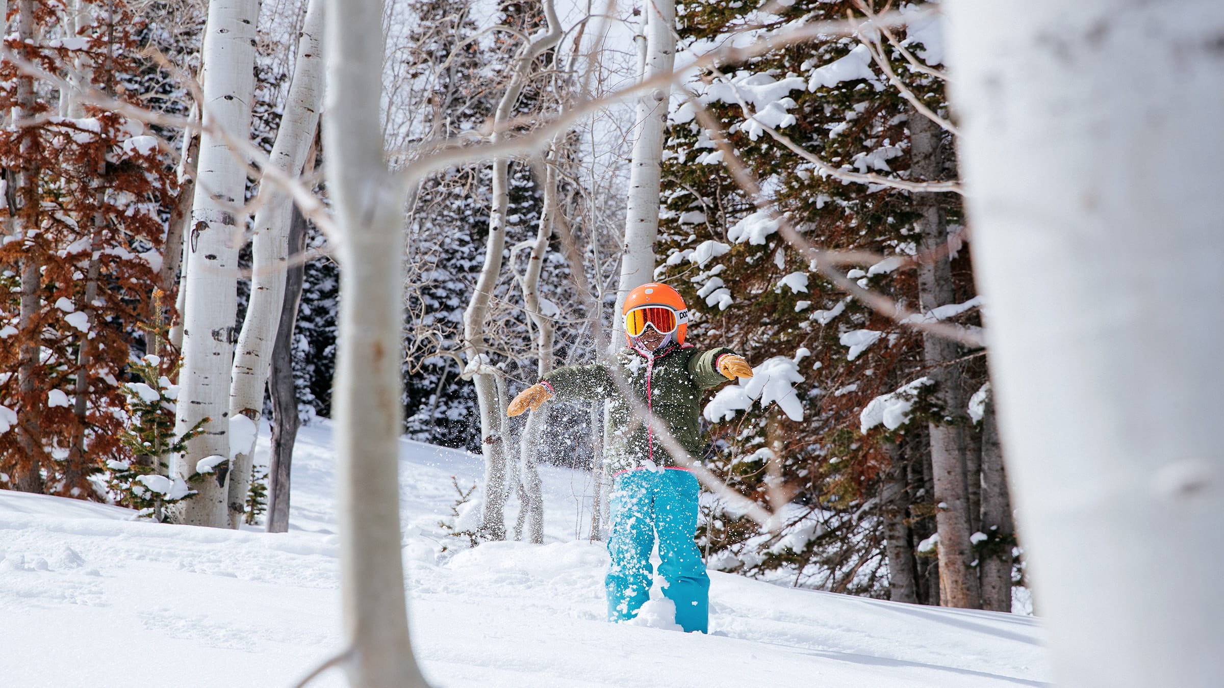 Boy playing in the snow.