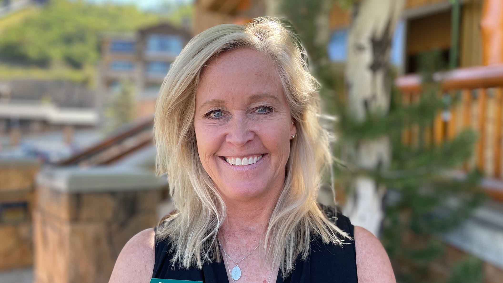 academy staff member smiling