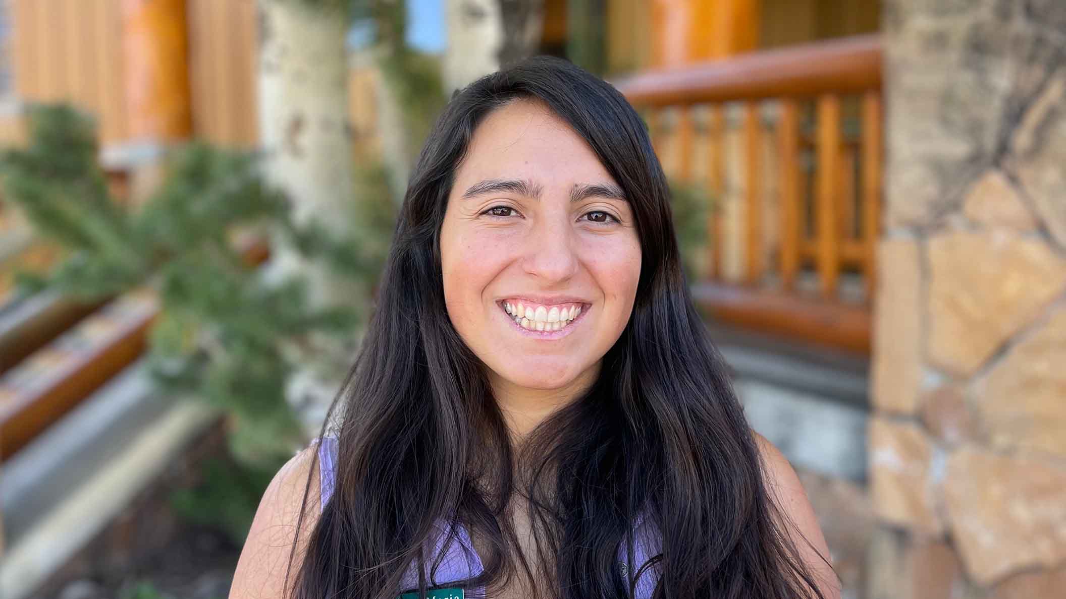 academy staff member smiling