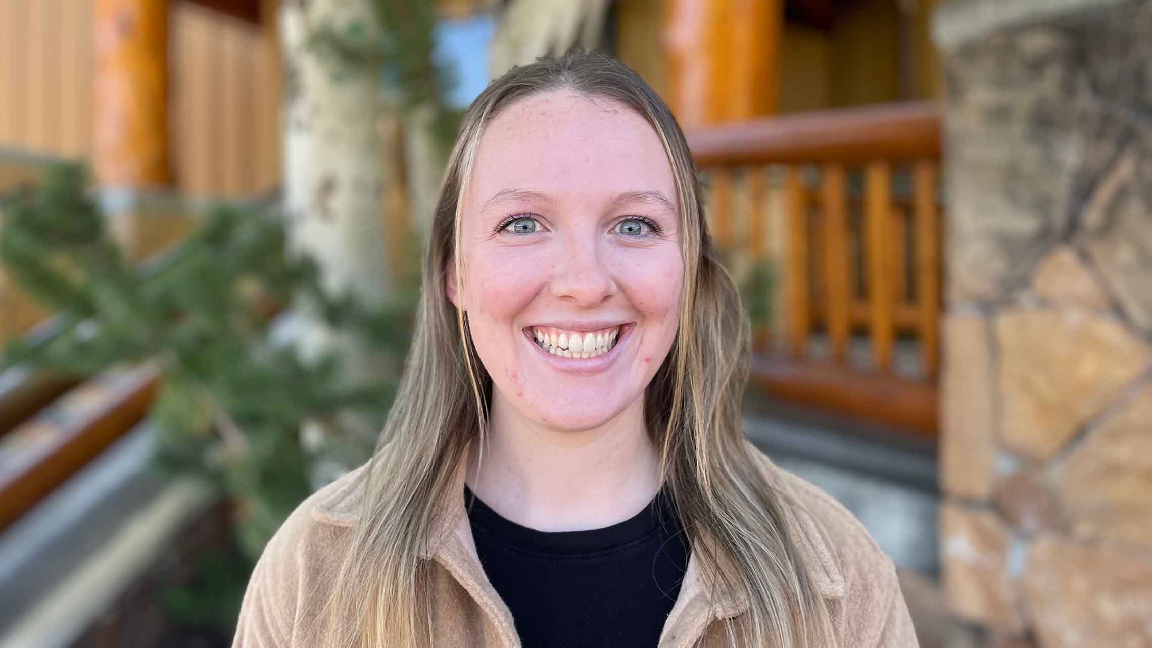 academy staff member smiling