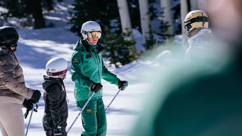 Guests skiing with Deer Valley ski instructor.