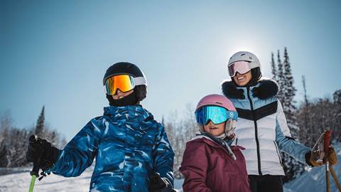 Boy and girl skiing with mother at Deer Valley.