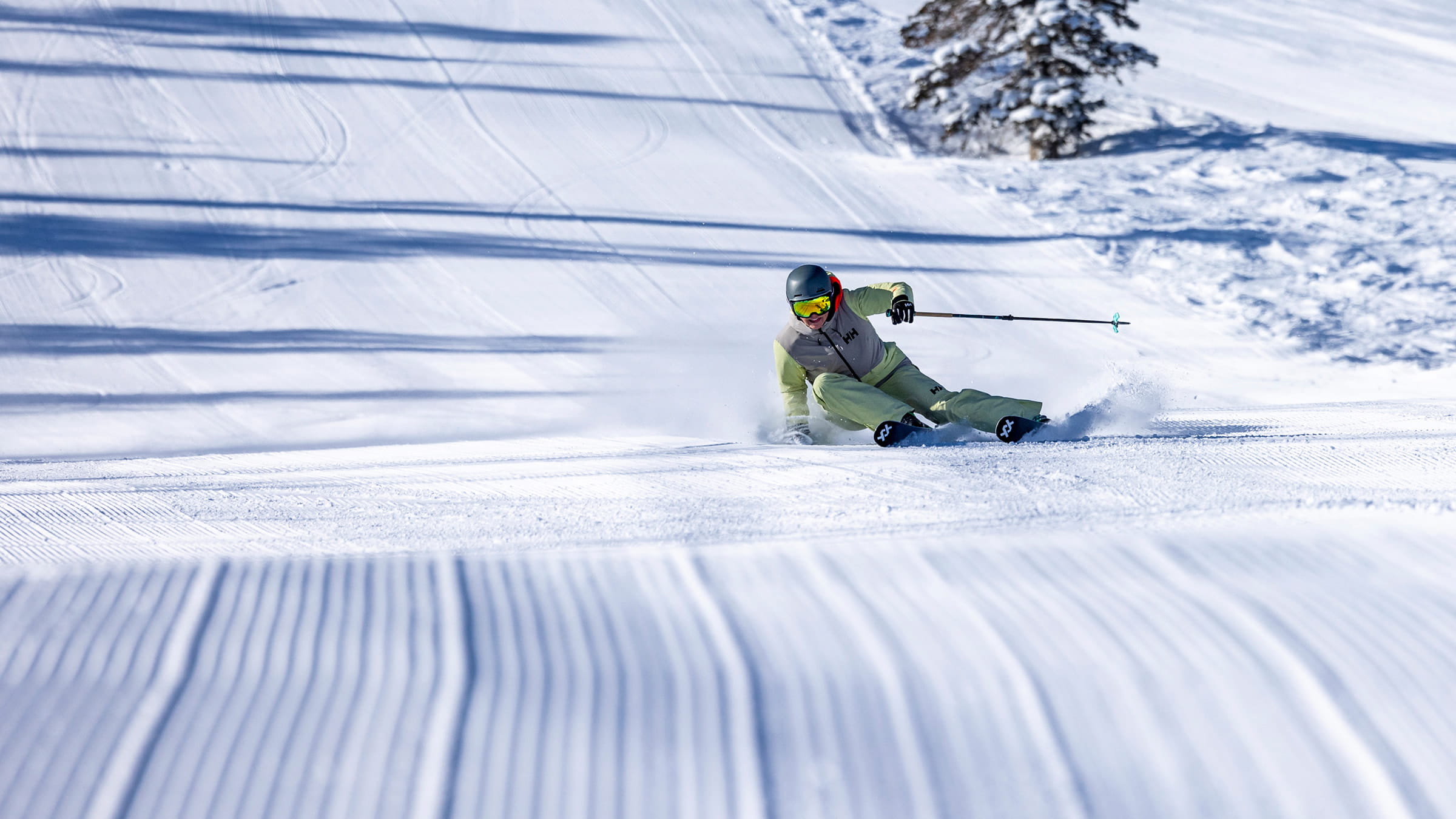 Woman skiing groomed run at Deer Valley Resort.