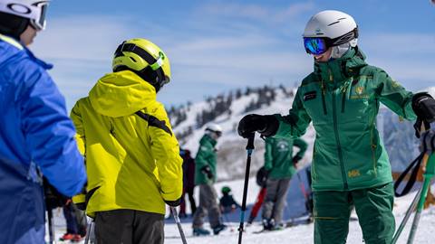 Deer Valley ski instructor teaching someone to ski.