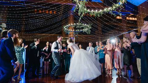 Bride and groom dancing at wedding in Deer Valley's Empire Canyon Lodge