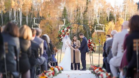 Bride and groom at fall Silver Lake Lawn ceremony.