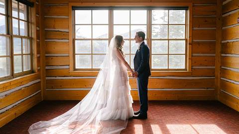 Bride and groom inside Deer Valley's wedding venue Cushing's Cabin