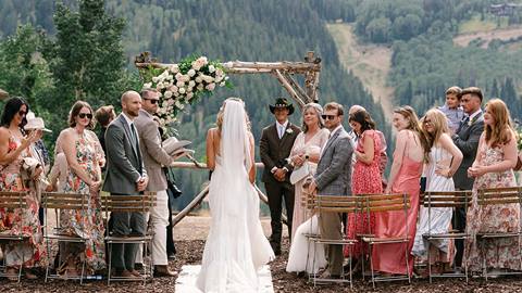 Bride walking down aisle at Deer Valley Homestake wedding cermony.