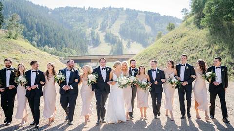 Bridal Party posing with a mountain view in Deer Valley's Silver Lake area.