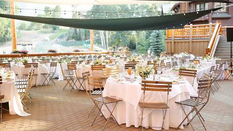 Wedding dinner setup at Deer Valley's Silver Lake deck.