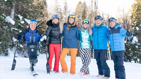 Deer Valley's Ski With a Champion team poses for a group photo. Jan. 10, 2022, Deer Valley Resort, Park City, UT. (Deer Valley Resort/Jason Peters)