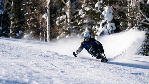 Chris Waddell of Deer Valley's "Ski With a Champion" program carves down the run Peeler. Jan. 10, 2022, Deer Valley Resort, Park City, UT. (Deer Valley Resort/Jason Peters)