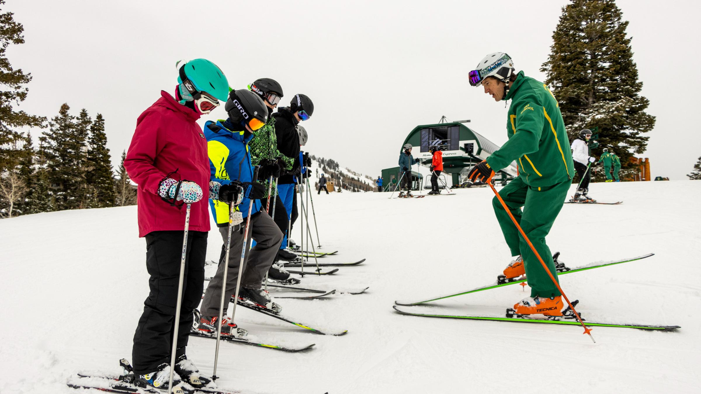 A Deer Valley instructor teaching an Adventure Club class