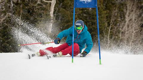 A guest skiing the NASTAR course
