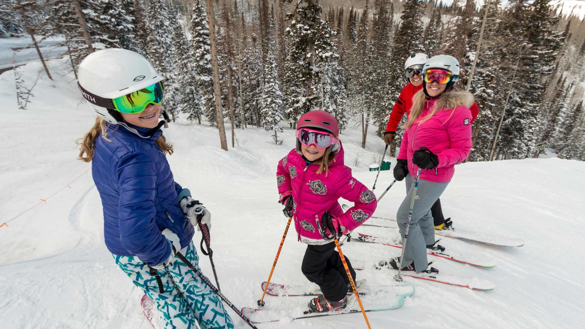 A family skiing at Deer Valley Resort