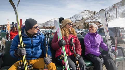 Guests taking the shuttle up to Snow Park Lodge
