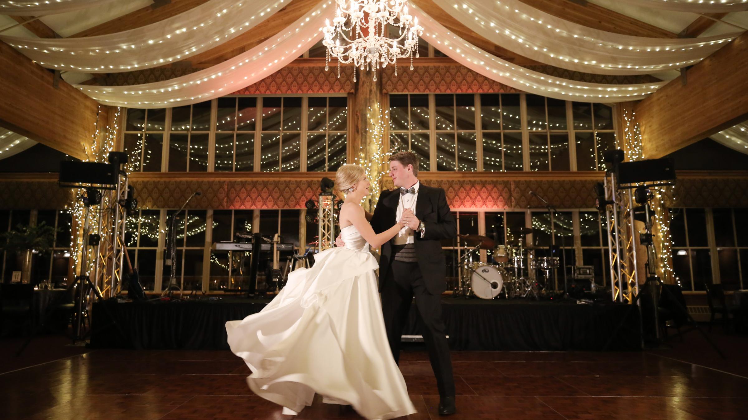 A bride and groom dancing