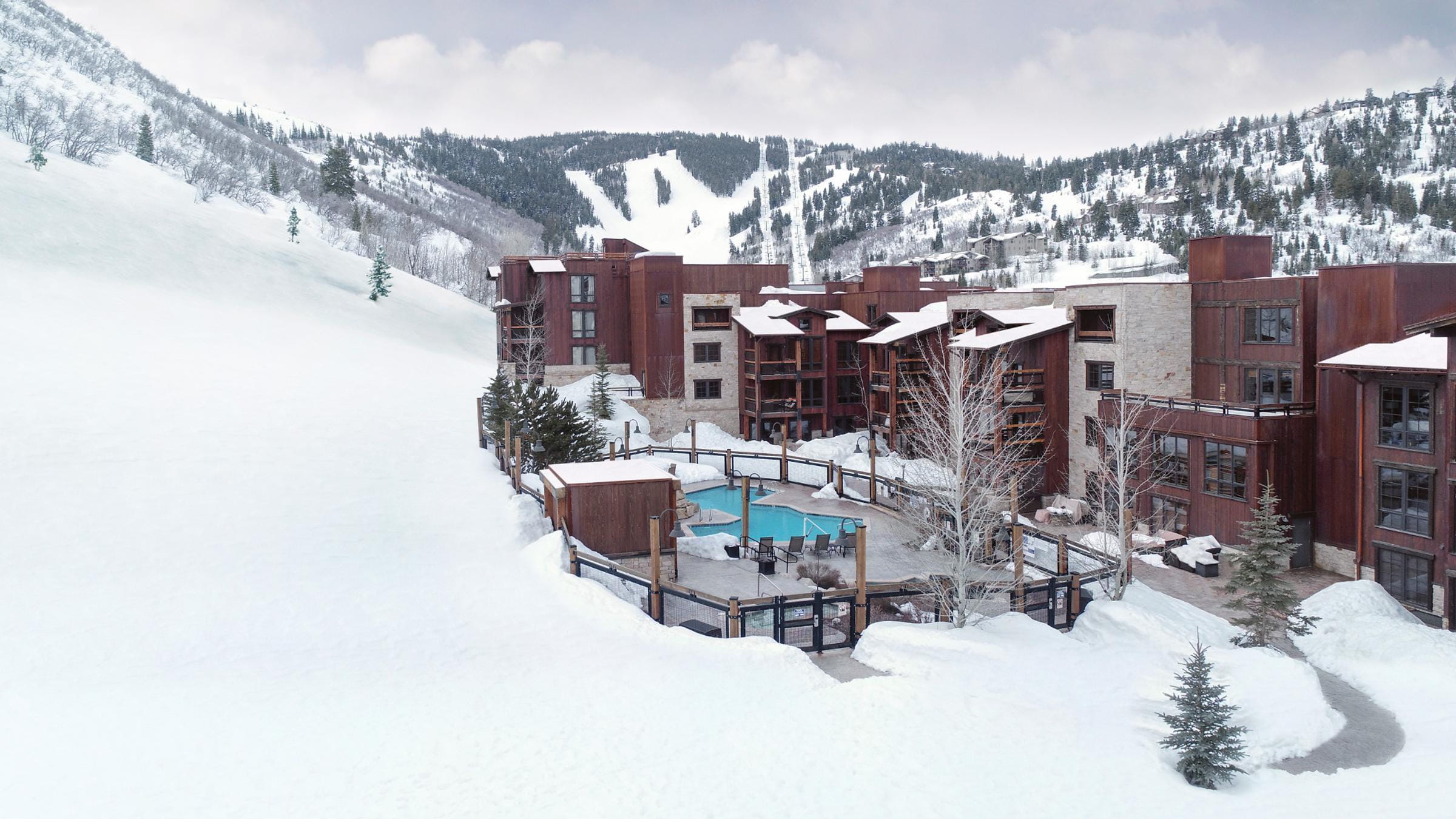 Winter exterior of Silver Baron Lodge, luxury condo rentals in Park City 