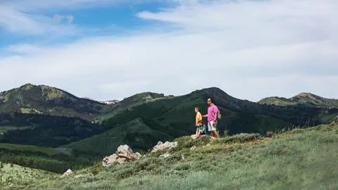 Three guests hiking at Deer Valley Resort