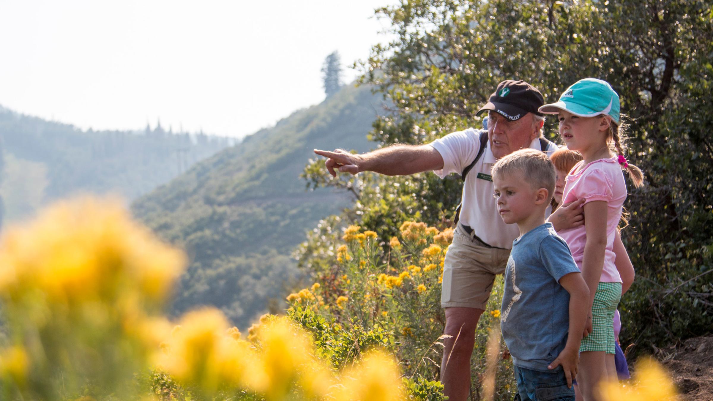 Deer Valley hiking guide educating guests about Park City, UT