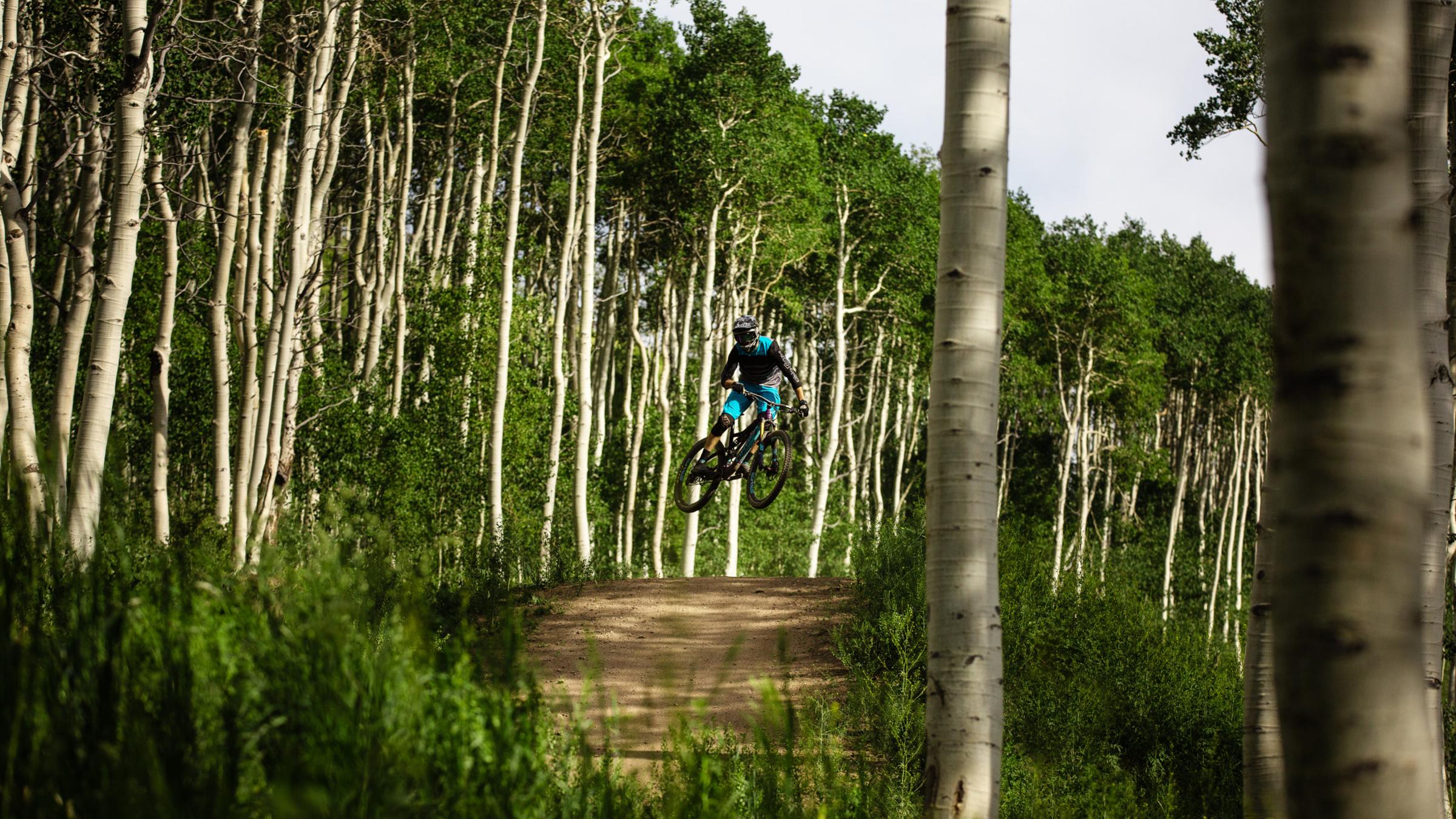 A guest mountain biking at Deer Valley