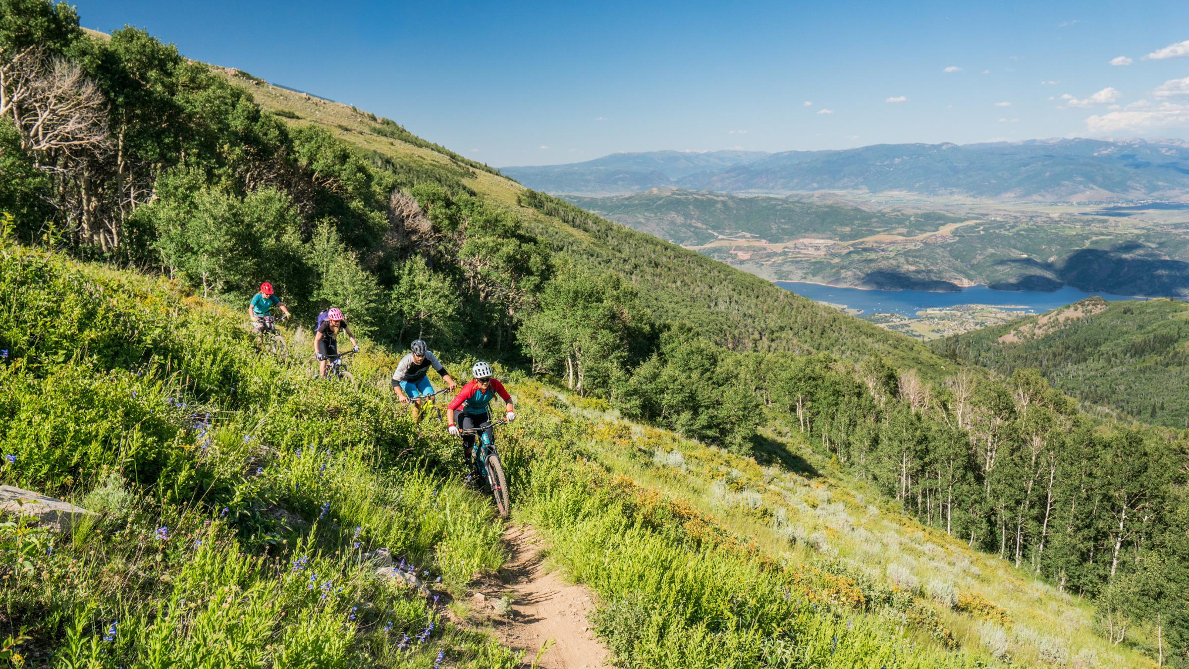 A group mountain biking at Deer Valley Resort