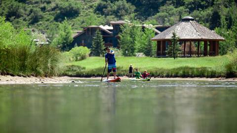 Guests paddleboarding