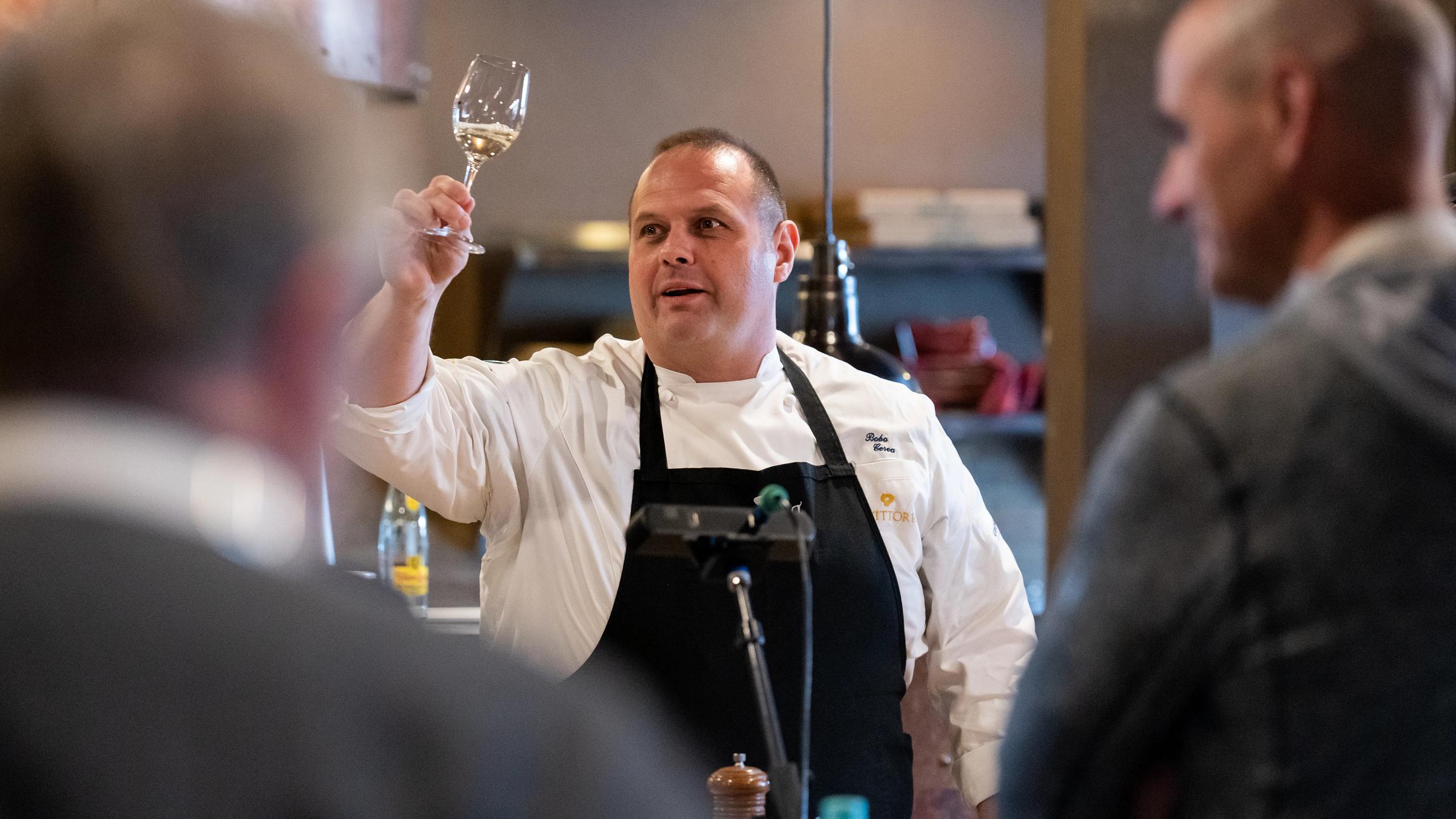 Chef with wine glass at Deer Valley