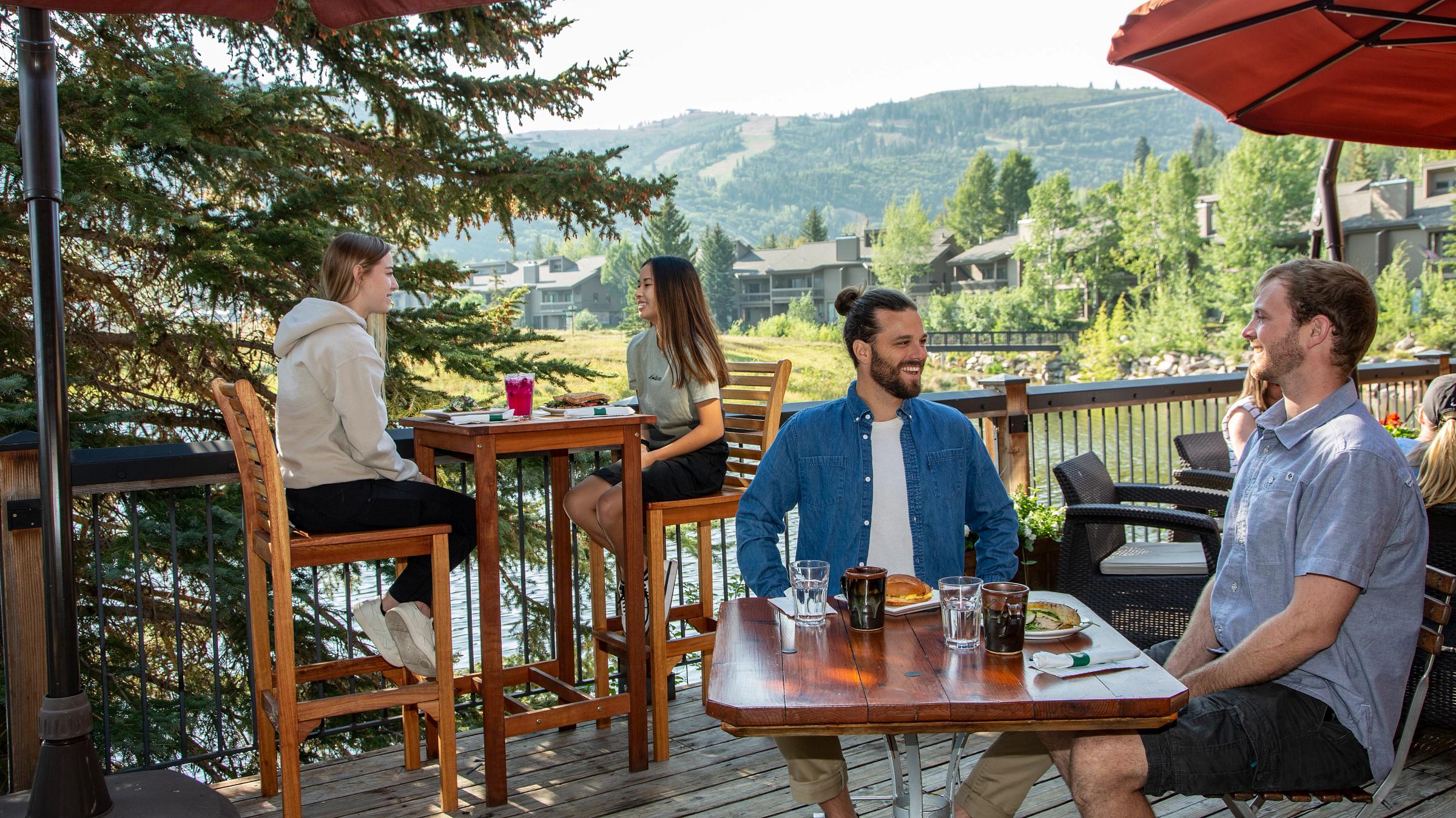 Diners enjoy a meal on the deck at Deer Valley in Park City, Utah