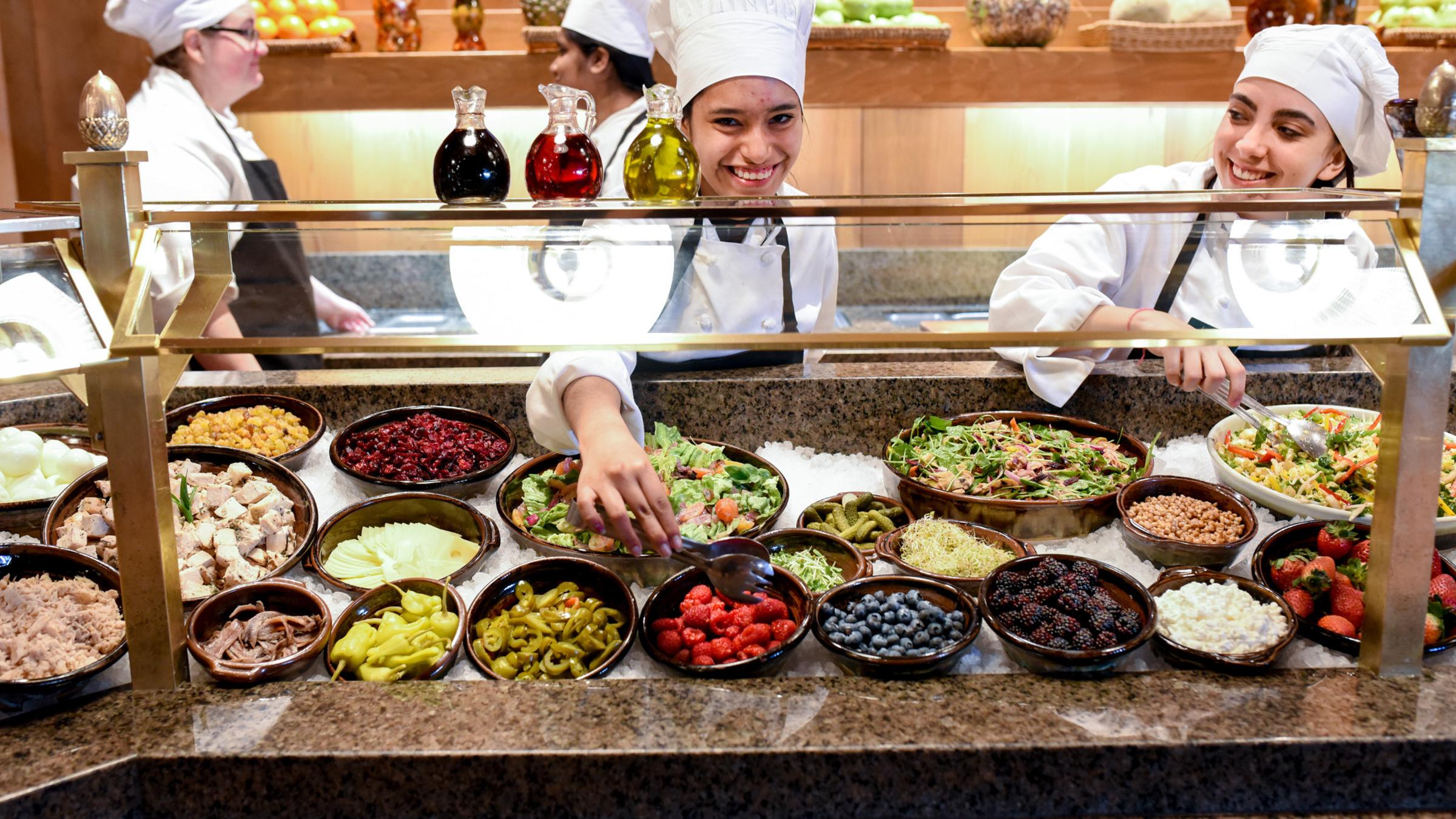 Deer Valley staff prepping the natural buffet smiling