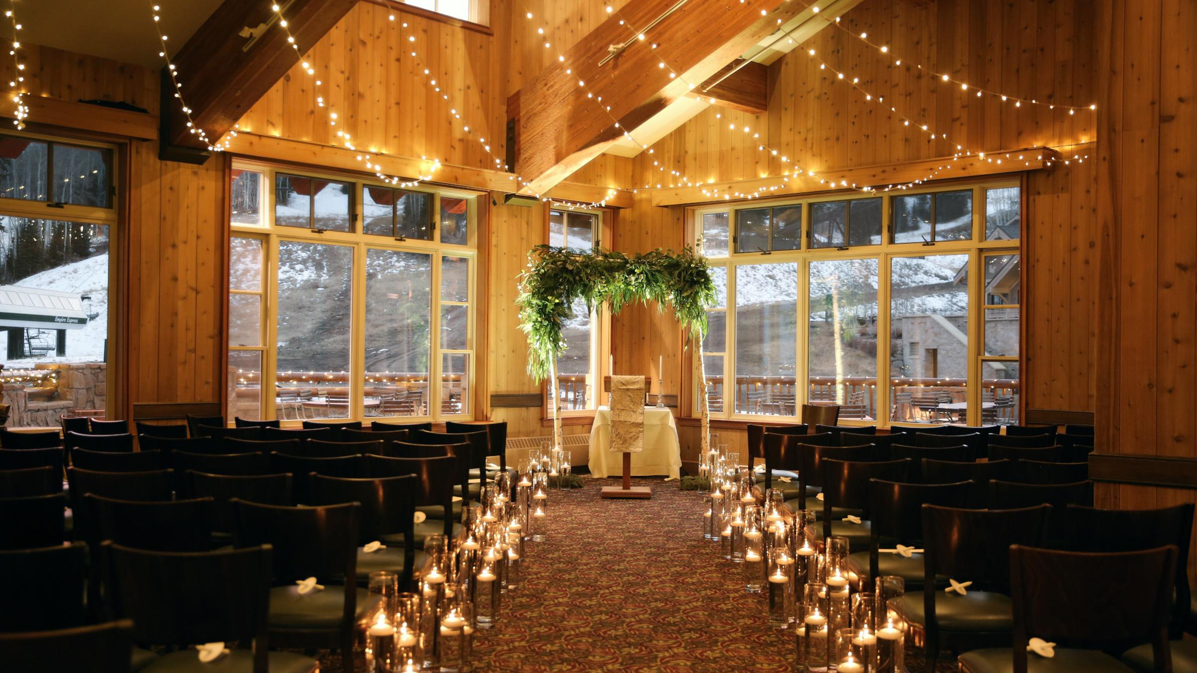 Indoor ceremony set up at Empire Canyon Lodge
