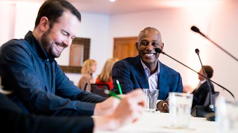 Team members enjoy collaborating during their conference at Deer Valley