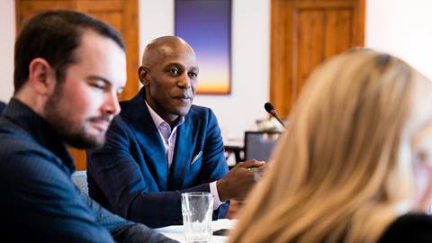 Conference attendees listen intently