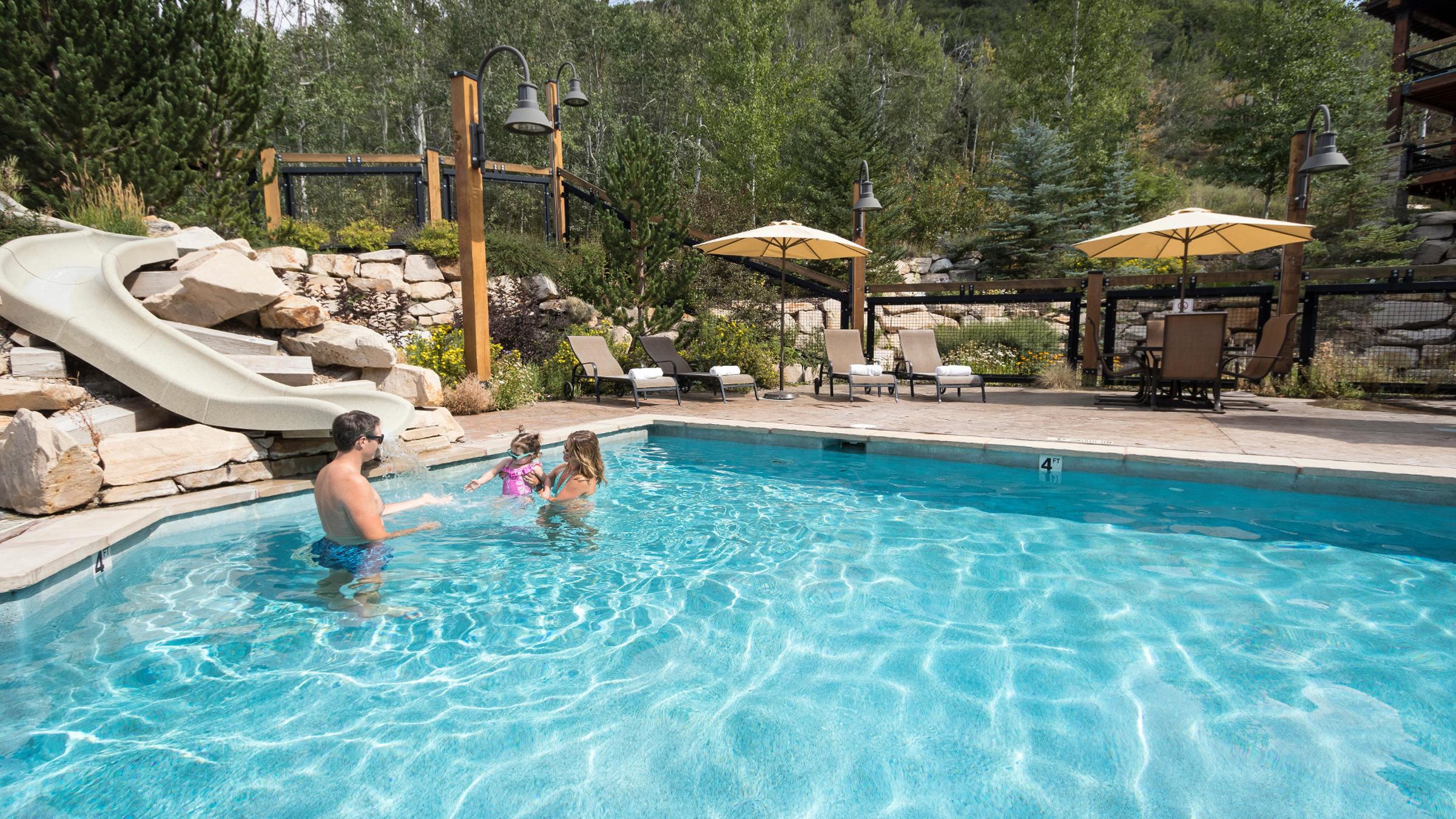 A family in the pool at Silver Baron Lodge